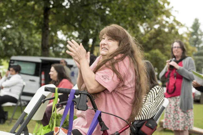 Dawna Burnett stops at her CSA pick-up to enjoy frittata and some music