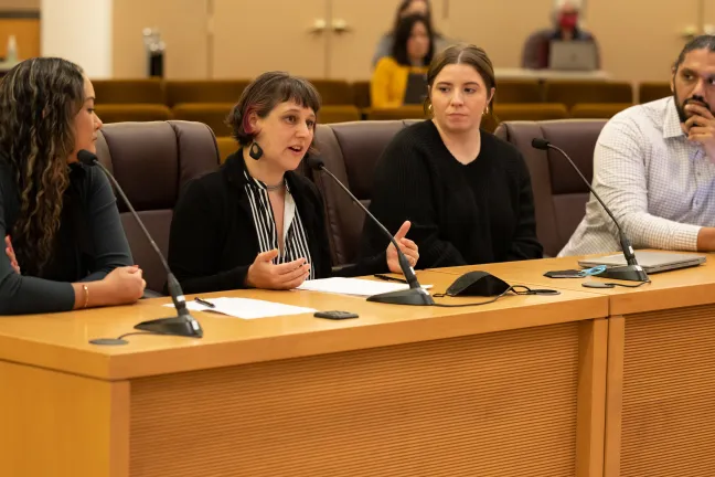 Photo of Kanoelehua Egleston, Lori Kelley, Anna Pendas and Joshua Bates of the Joint Office of Homeless Services presenting in the boardroom.