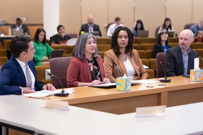 From left: Office of Sustainability Director John Wasiutynski, Desiree Eden Ocampo, executive director of Rahab's Sisters, Sustainability Engagement Specialist Monique Smiley, and Brendon Haggerty, Healthy Homes & Communities Manager