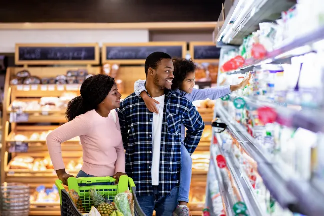 Photo of people grocery shopping