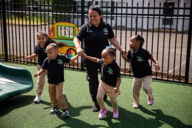Preschool teacher with children