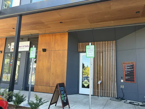 Entrance and signs for our temporary WIC location at the Rockwood Market Hall building